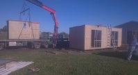 Padden Builders with there massive crane placing three of our perfect cabins made by Padden Builders