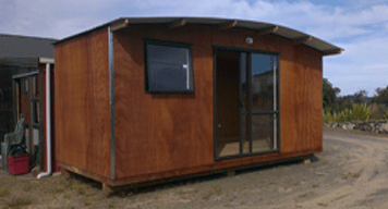 an awesome wooden finish on this medium sized cabin made by our builder at Padden Builders