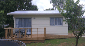 One bedroom cabin with a beautiful wooden deck Built by Padden Builders